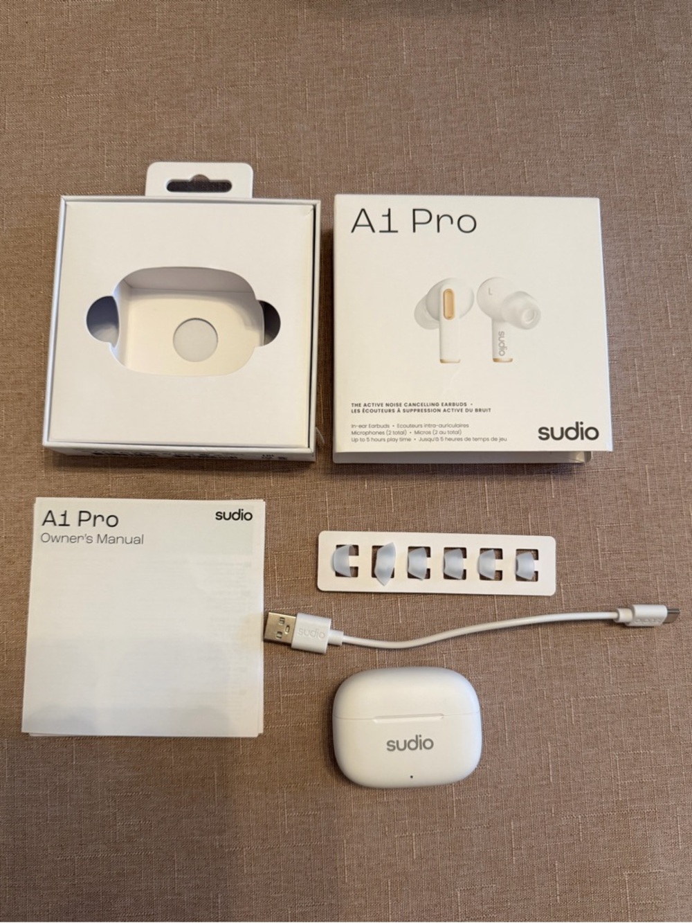 Like new Studio A1 Pro True Wireless Earbuds in White with Charging Case